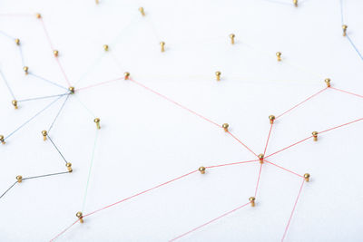 High angle view of decoration hanging on white background