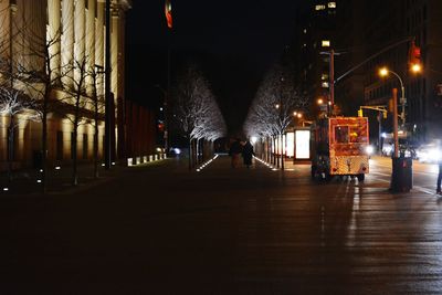 Illuminated street light at night