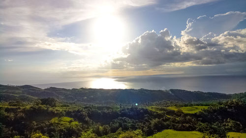 Scenic view of landscape against sky during sunset