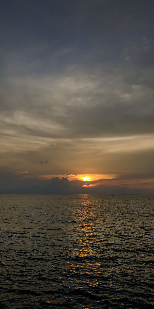 sky, water, sea, sunset, beauty in nature, scenics - nature, tranquility, tranquil scene, horizon over water, horizon, cloud, nature, idyllic, no people, ocean, waterfront, sunlight, outdoors, orange color, dramatic sky, seascape, rippled, reflection, afterglow, sun, non-urban scene, coast, evening