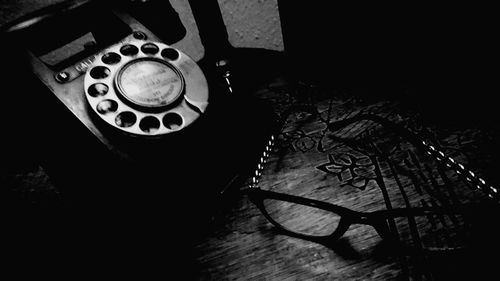 High angle view of telephone on table