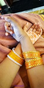 High angle view of couple holding hands