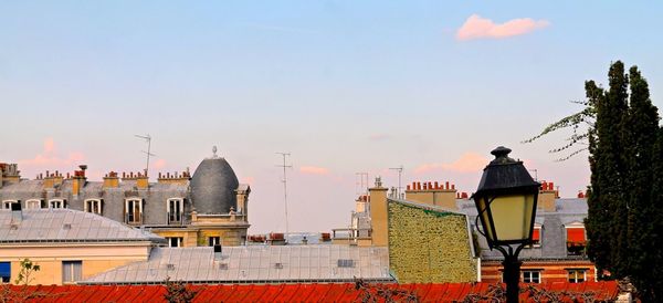 Built structure against sky at sunset