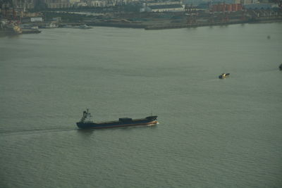 High angle view of boat sailing in river