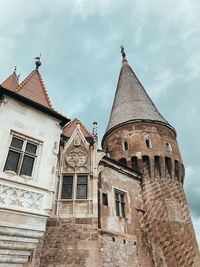 Low angle view of old building against sky