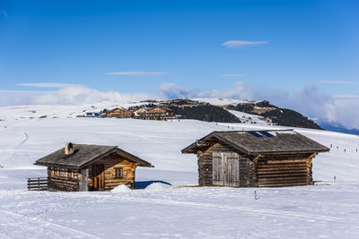 Dream huts on the alpe di siusi. in the white. dolomites, italy