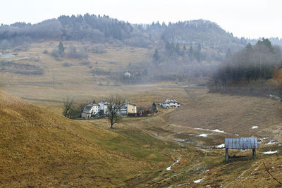 High angle view of townscape against mountain