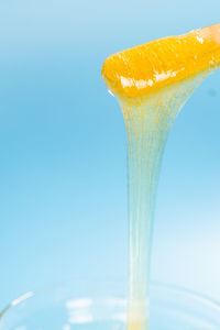 Close-up of banana against blue background