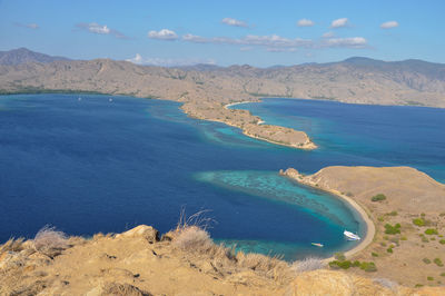 High angle view of sea shore against sky