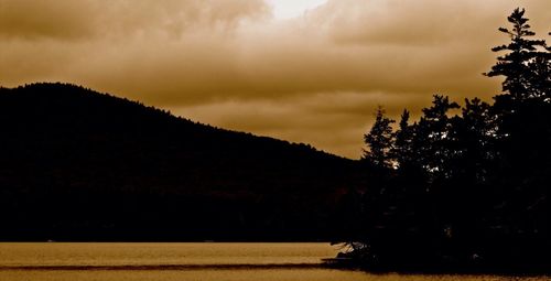 Scenic view of landscape against cloudy sky