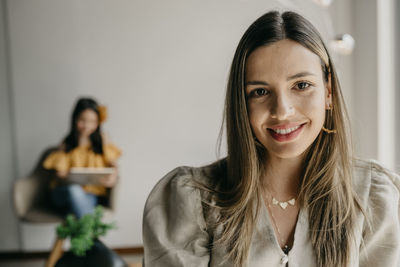 Portrait of a smiling young woman