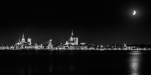 Illuminated cityscape at night