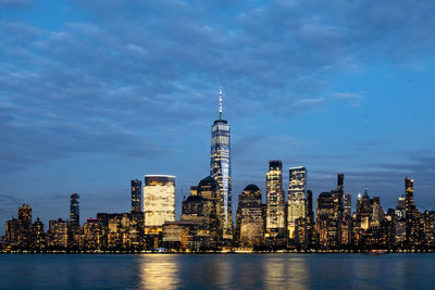 View of lower manhattan skyline at sundown