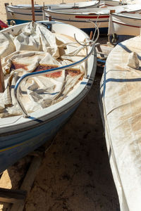 High angle view of fishing boats moored in water