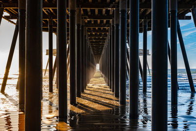 View of pier over sea against sky