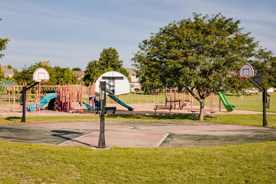 Open park basketball courts on a sunny morning