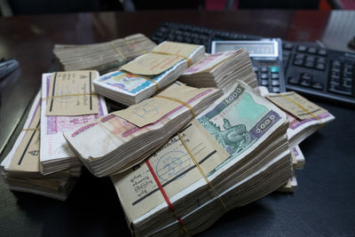 Close-up of currency on table