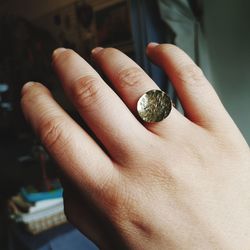 Cropped hand of woman wearing ring