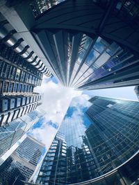 Low angle view of modern buildings against sky