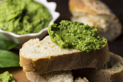 Close-up of slice of bread and guacamole 