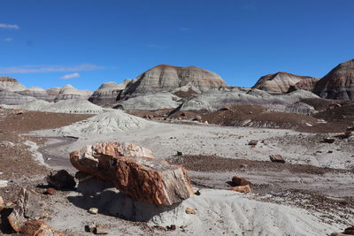 Scenic view of rocky mountains against clear blue sky