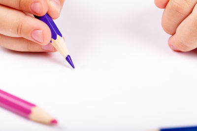 Close-up of hand drawing on table