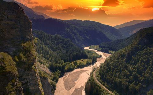 Panoramic view of landscape against sky during sunset