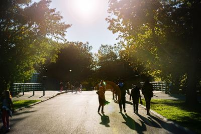 People at park against sky