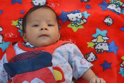 High angle portrait of cute baby lying down