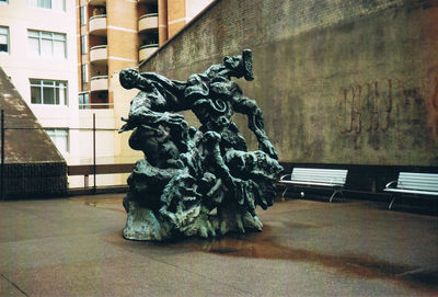 Statue against wall in building
