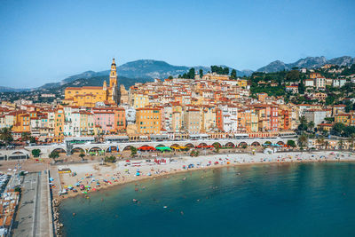 Aerial view of townscape against sky