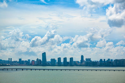 View of buildings in city against sky