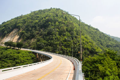 Scenic view of mountain road against sky