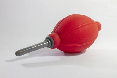 High angle view of red ball on table