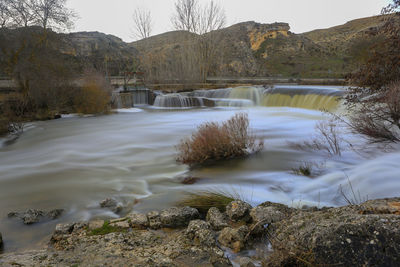 Scenic view of river against sky