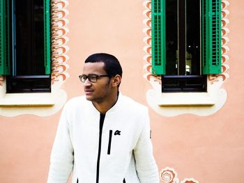 Portrait of young man looking away