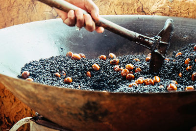 Close-up of person preparing food