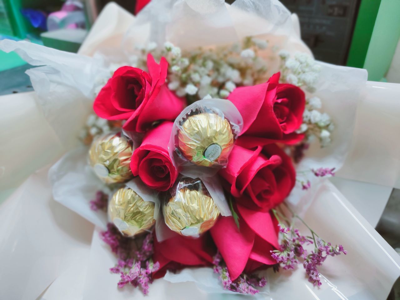 HIGH ANGLE VIEW OF ROSES IN BOUQUET OF RED ROSE