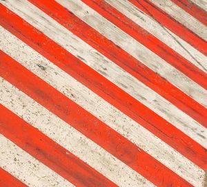 Full frame shot of red striped lines at adolfo suarez madridbarajas airport