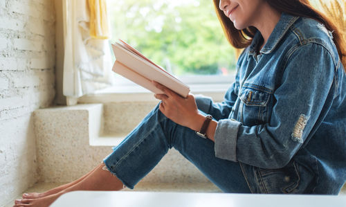 Young woman using mobile phone
