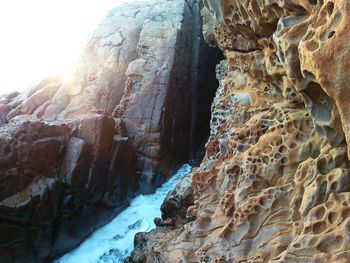 Close-up of icicles on rock