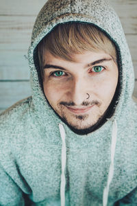 Portrait of young man wearing hat