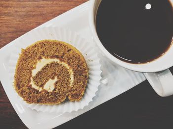 High angle view of coffee cup on table
