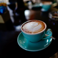 Close-up of coffee cup on table