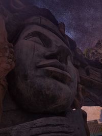 Low angle view of buddha statue