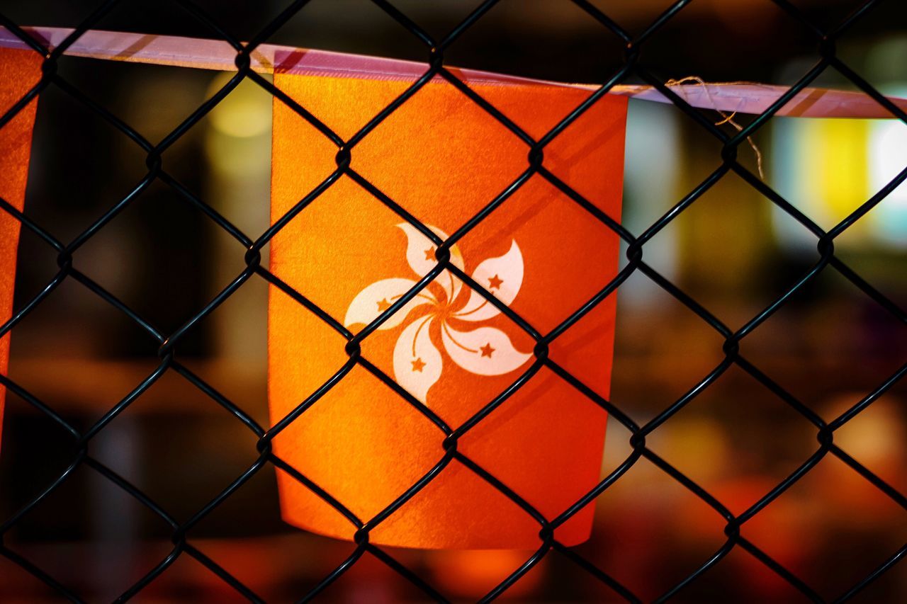 protection, safety, fence, chainlink fence, security, full frame, backgrounds, metal, close-up, orange color, focus on foreground, selective focus, change, day, outdoors, chainlink, in front of, symbol