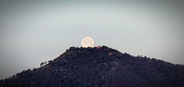 Low angle view of rock against sky