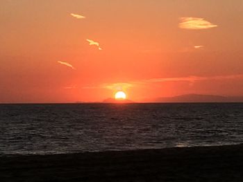 Scenic view of sea at sunset