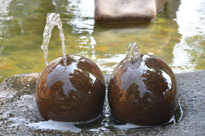 Close-up of rocks in lake during winter