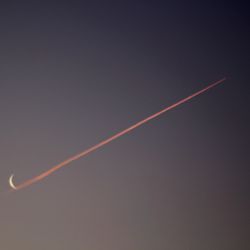 Low angle view of vapor trails in sky